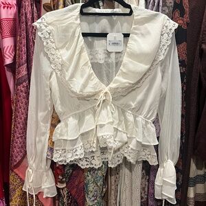 Sheer ruffle bib collar top